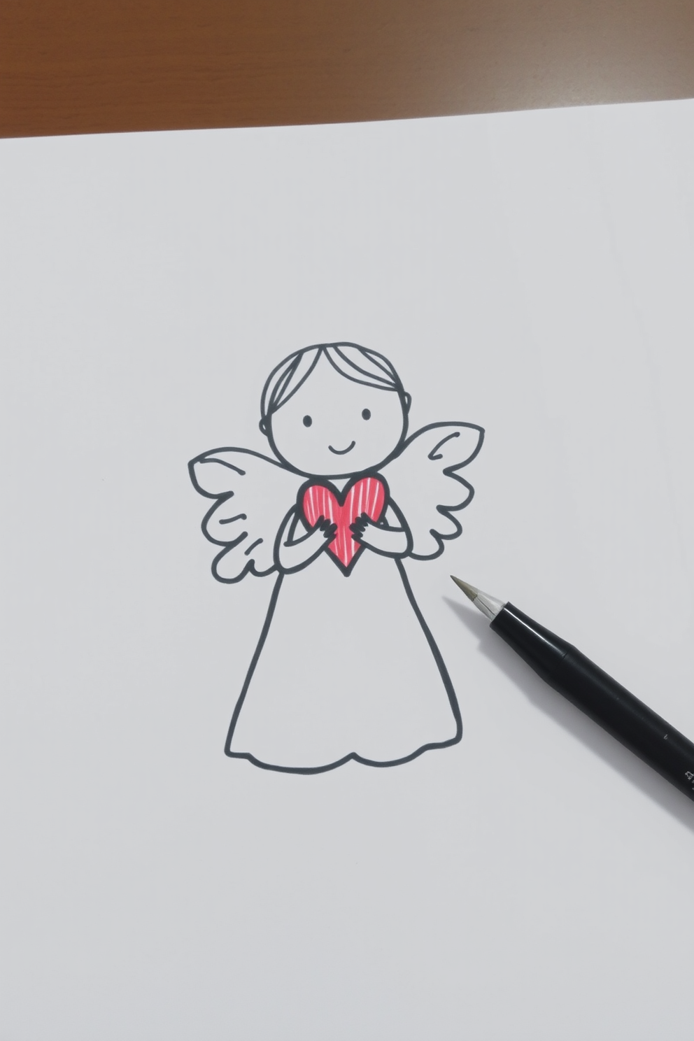 Cute Angel Drawing with a Heart