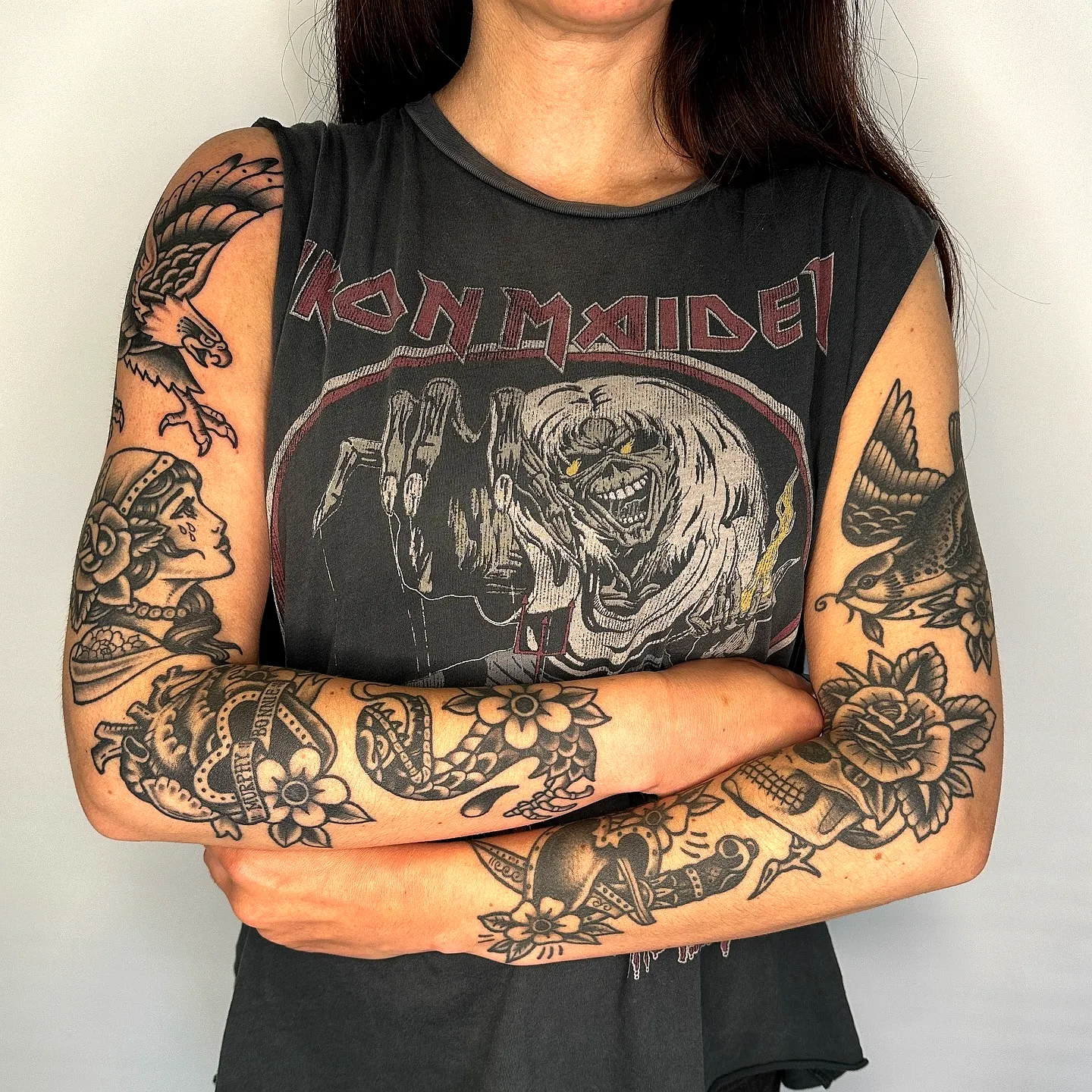 Intricate floral and skull shoulder tattoo for women