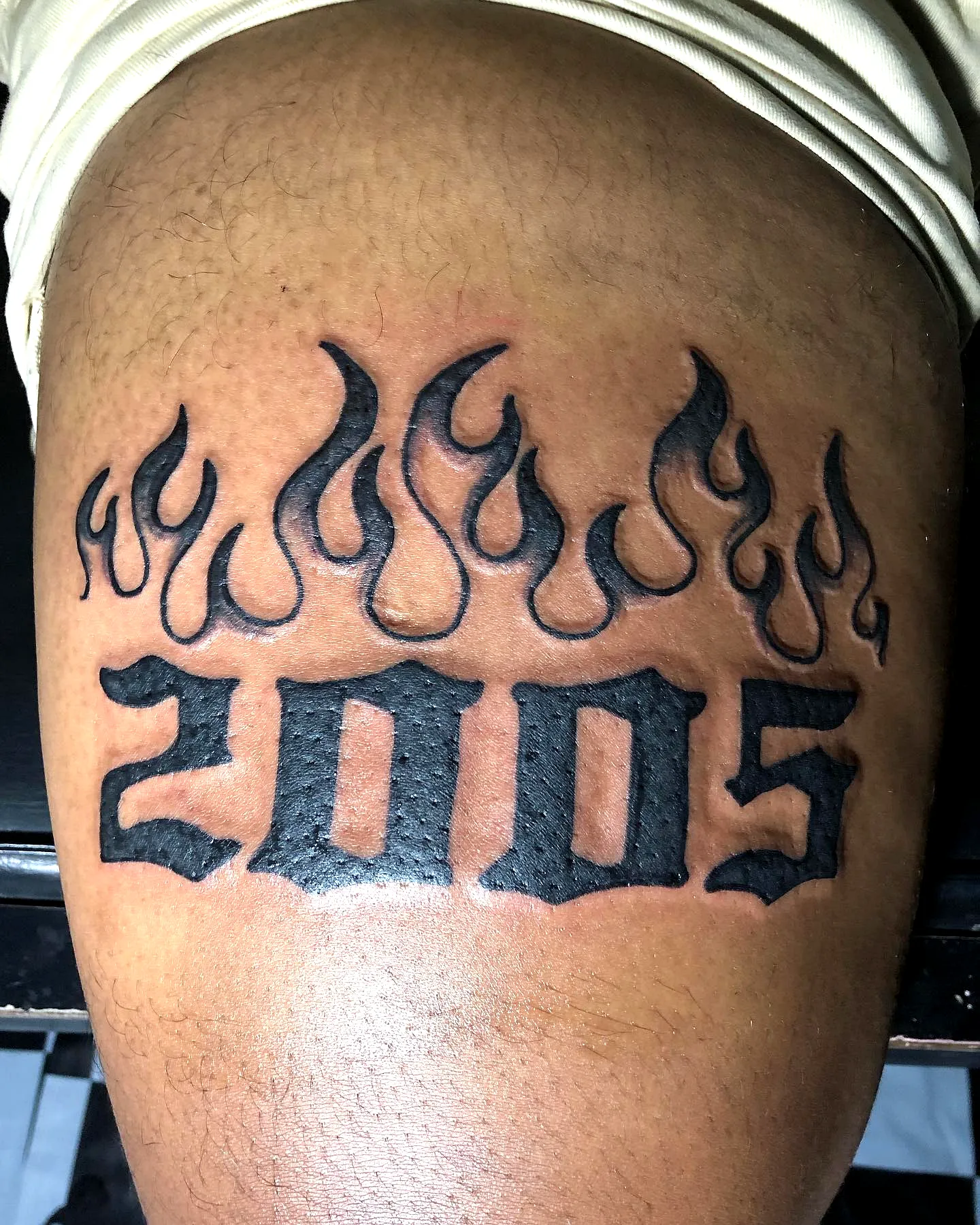 2005 Gothic Flames Thigh Tattoo