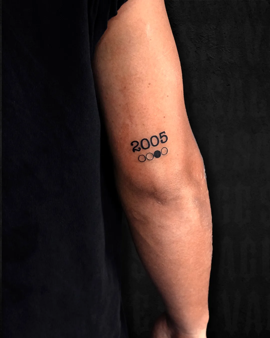 2005 Minimalistic Forearm Tattoo