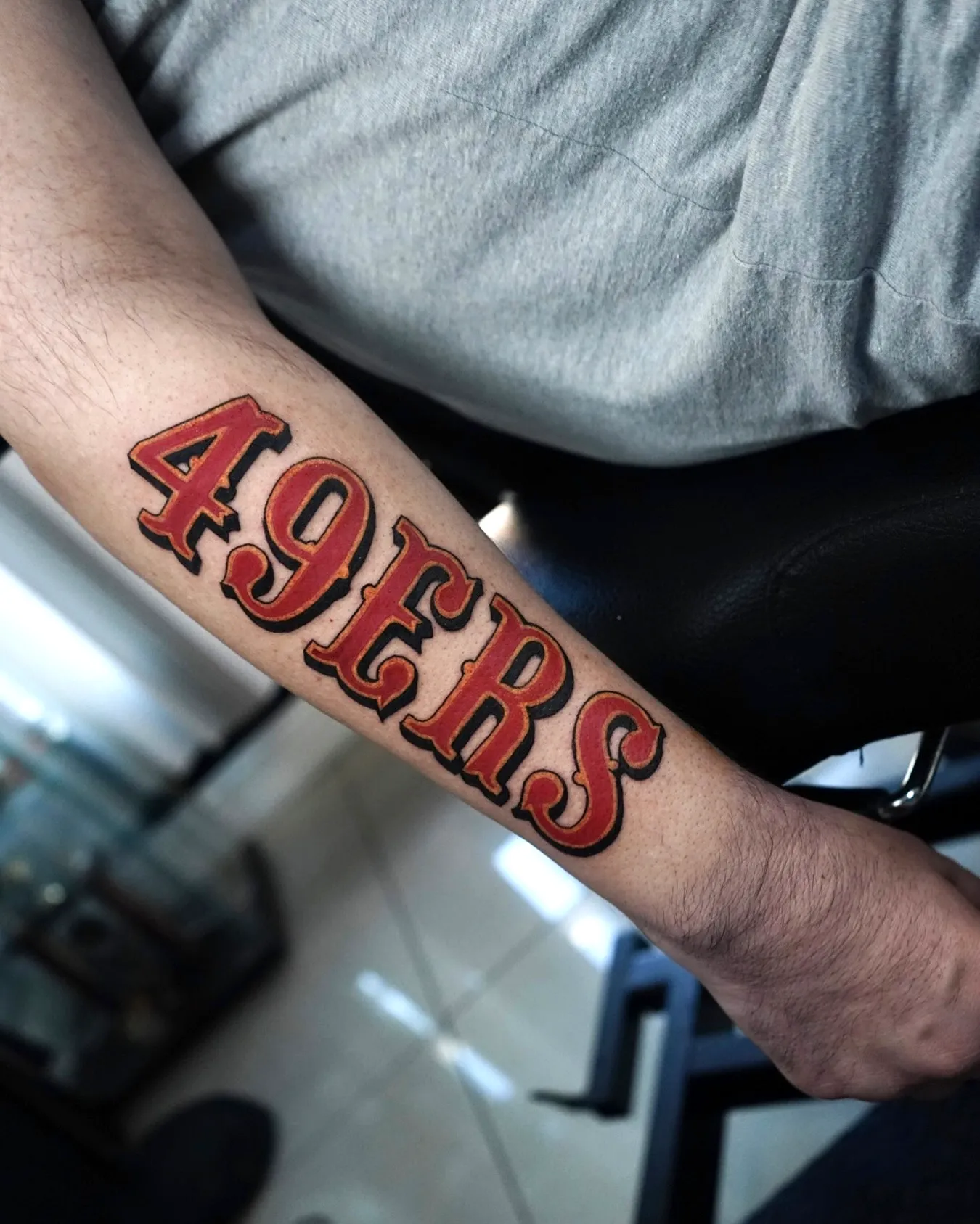 49ERS Forearm Tattoo in Bold Vintage Style