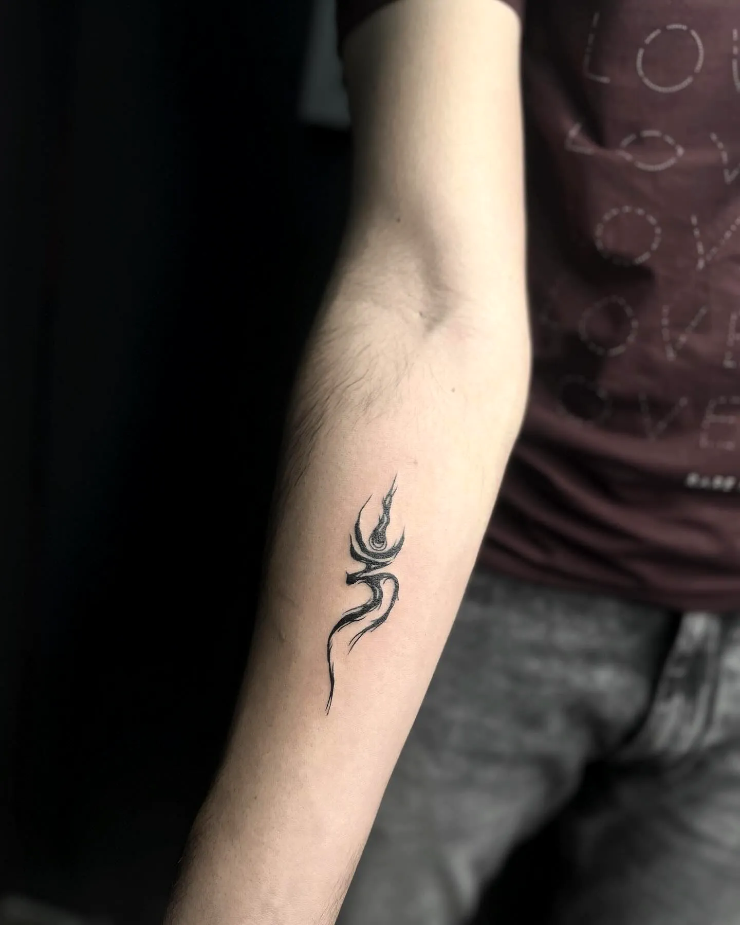 Abstract Black Ink Forearm Tattoo