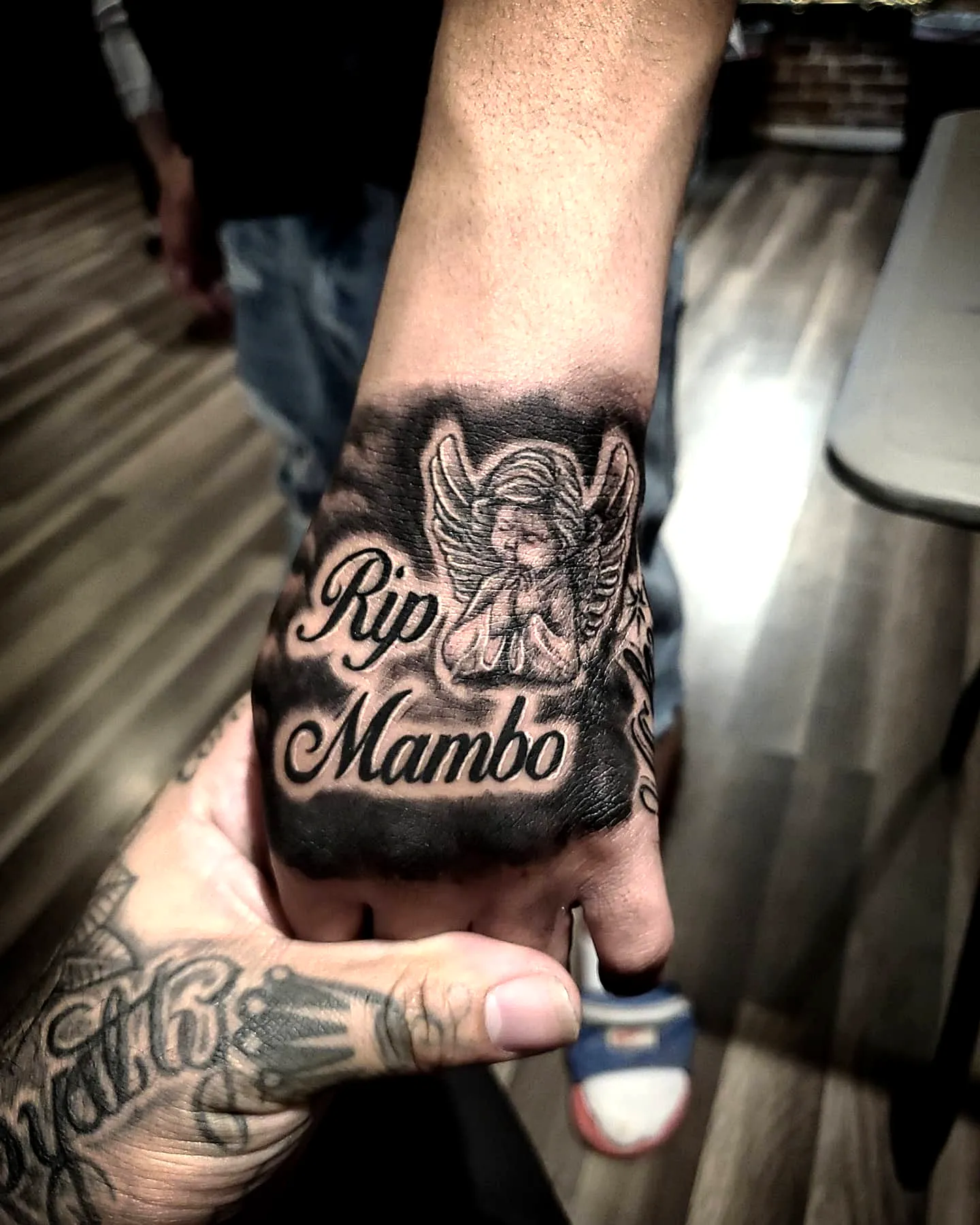 Angel Hand Tattoo in Black and Gray