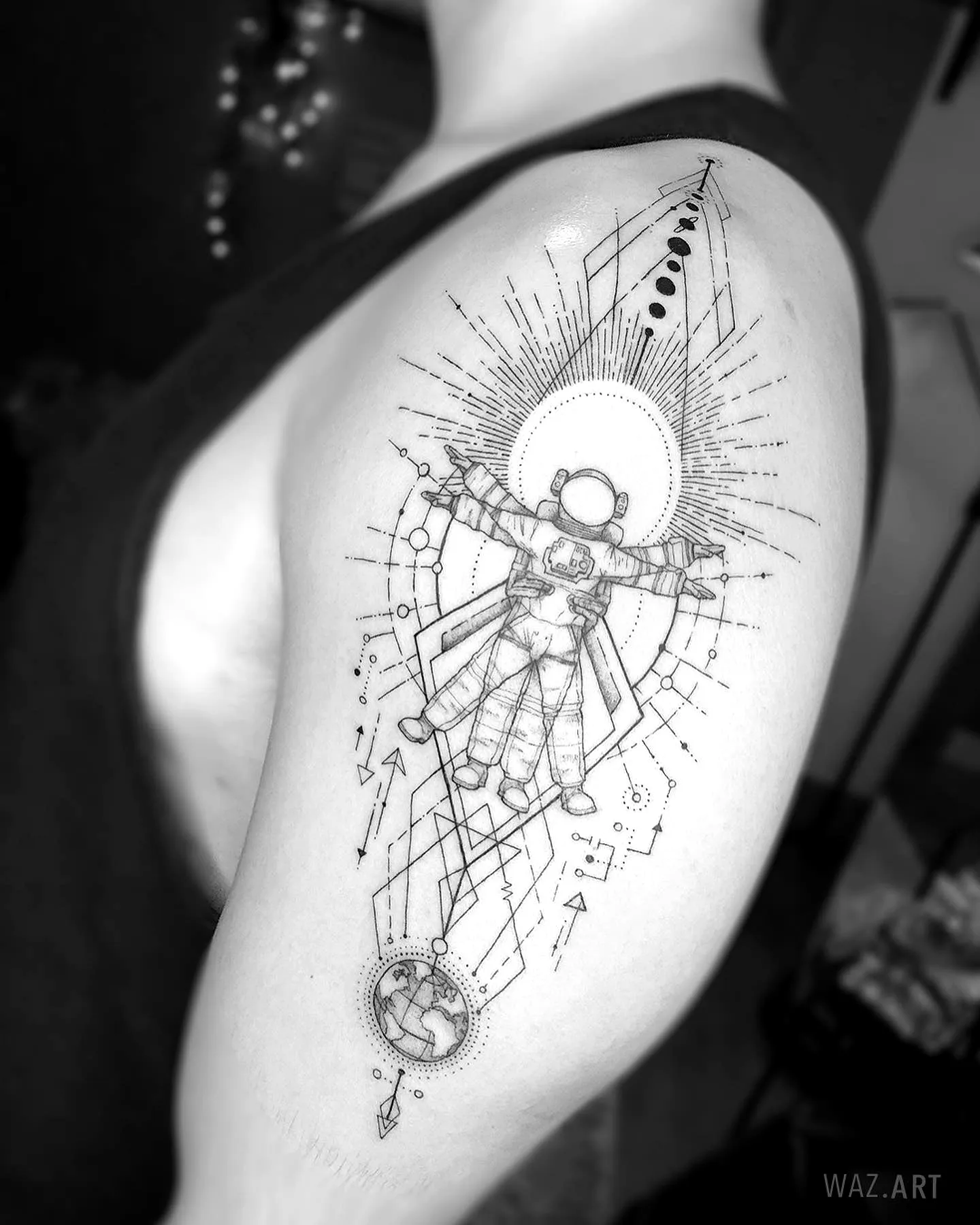 Astronaut Upper Arm Tattoo