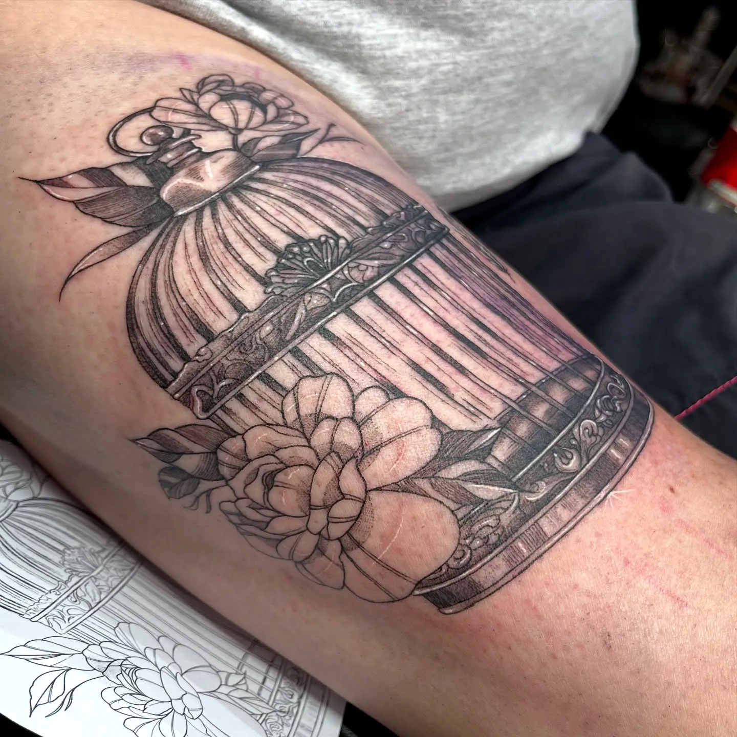 Birdcage Rose Upper Arm Tattoo