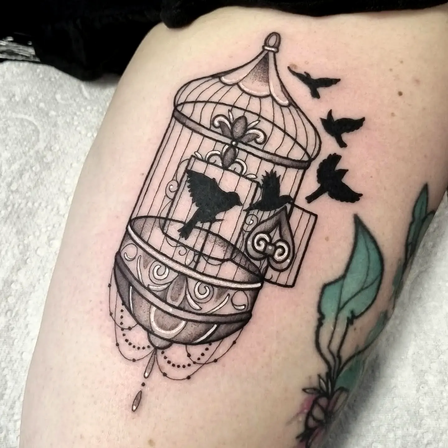 Birdcage Thigh Tattoo with Black Birds