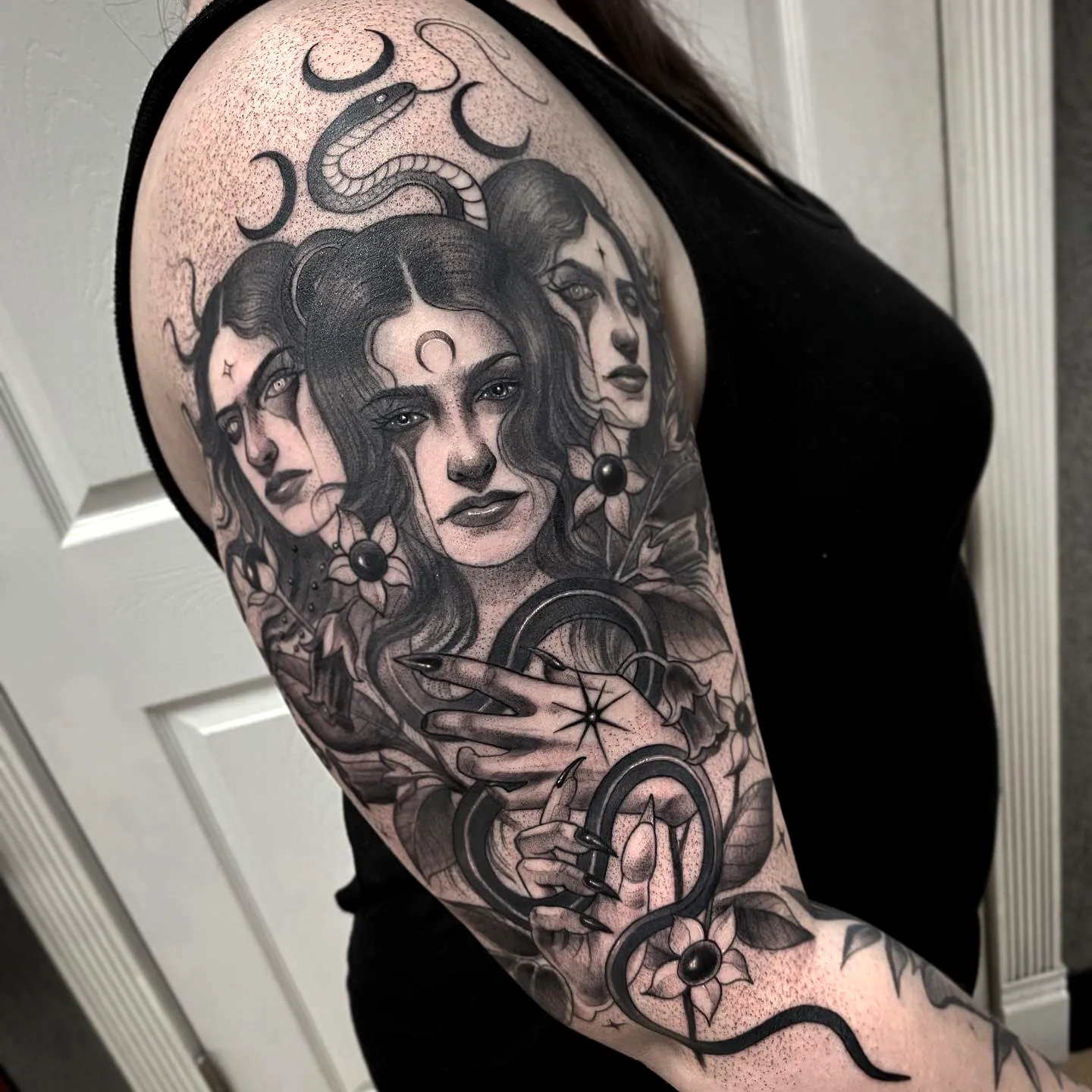 Black and Gray Hecate Upper Arm Tattoo