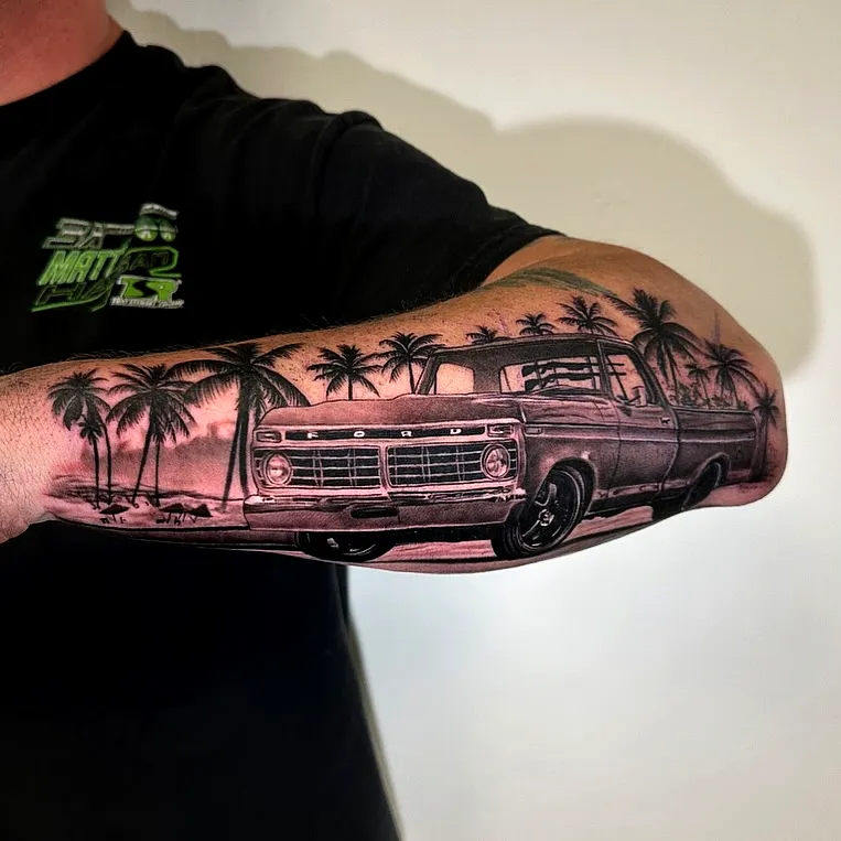 Black and Gray Truck Forearm Tattoo