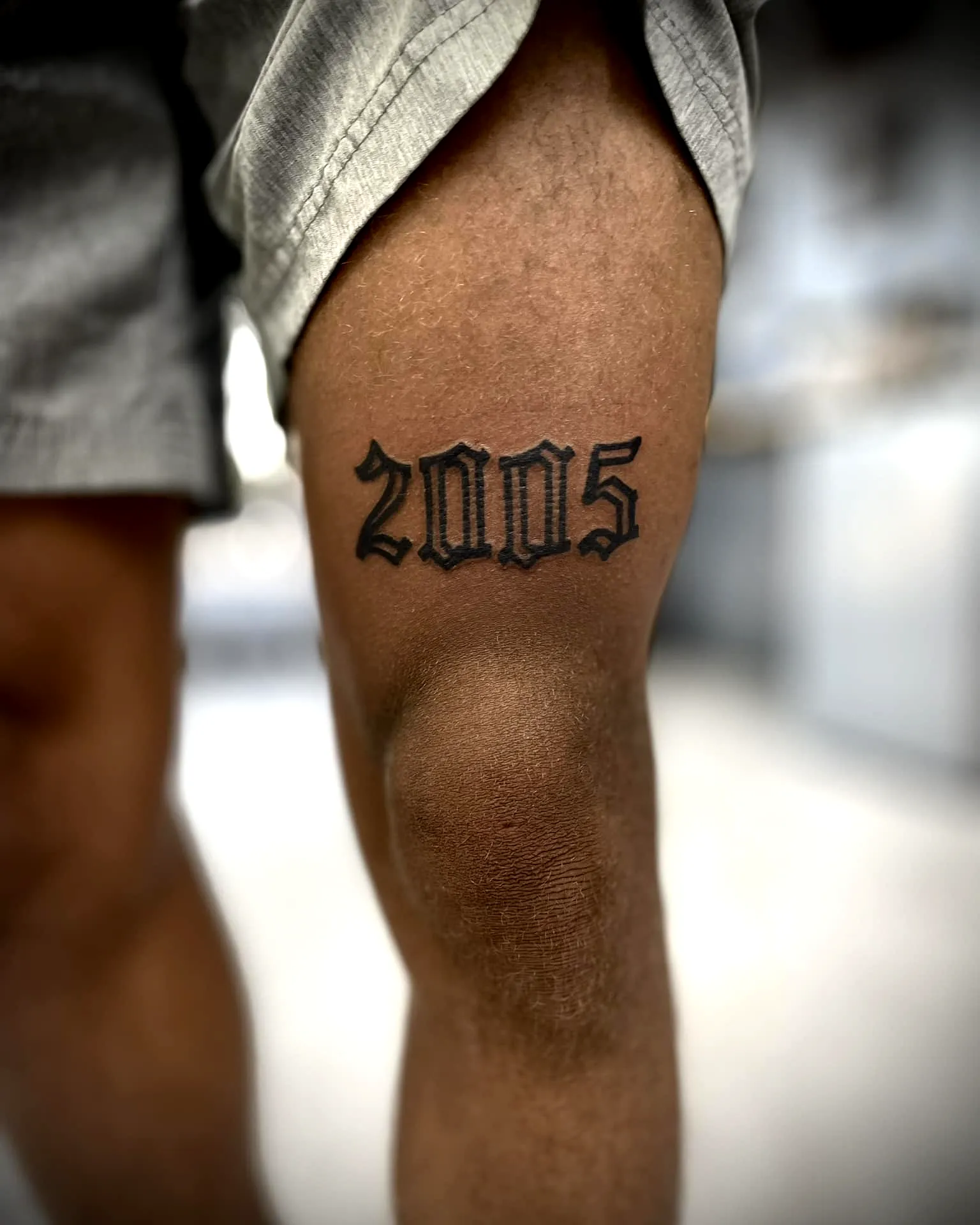 Bold Black 2005 Knee Tattoo