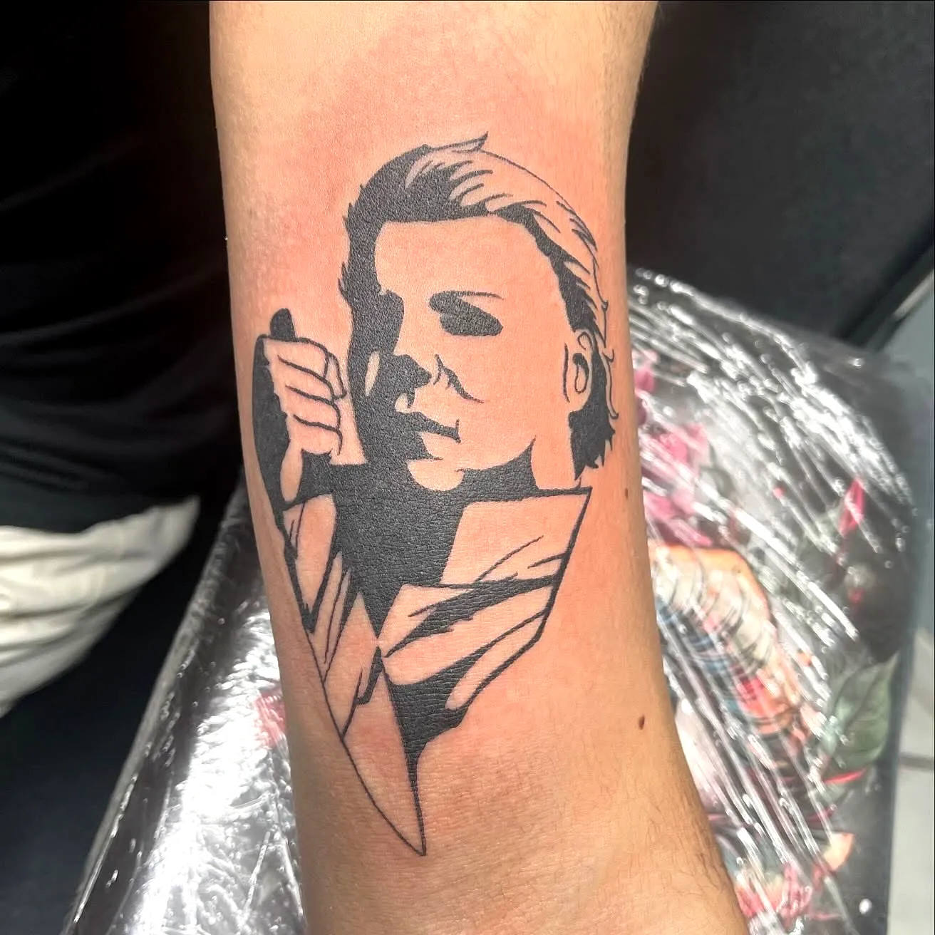 Bold Blackwork Forearm Tattoo