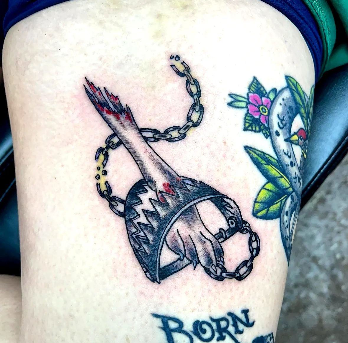 Broken Chain Hand Tattoo in Black and Red