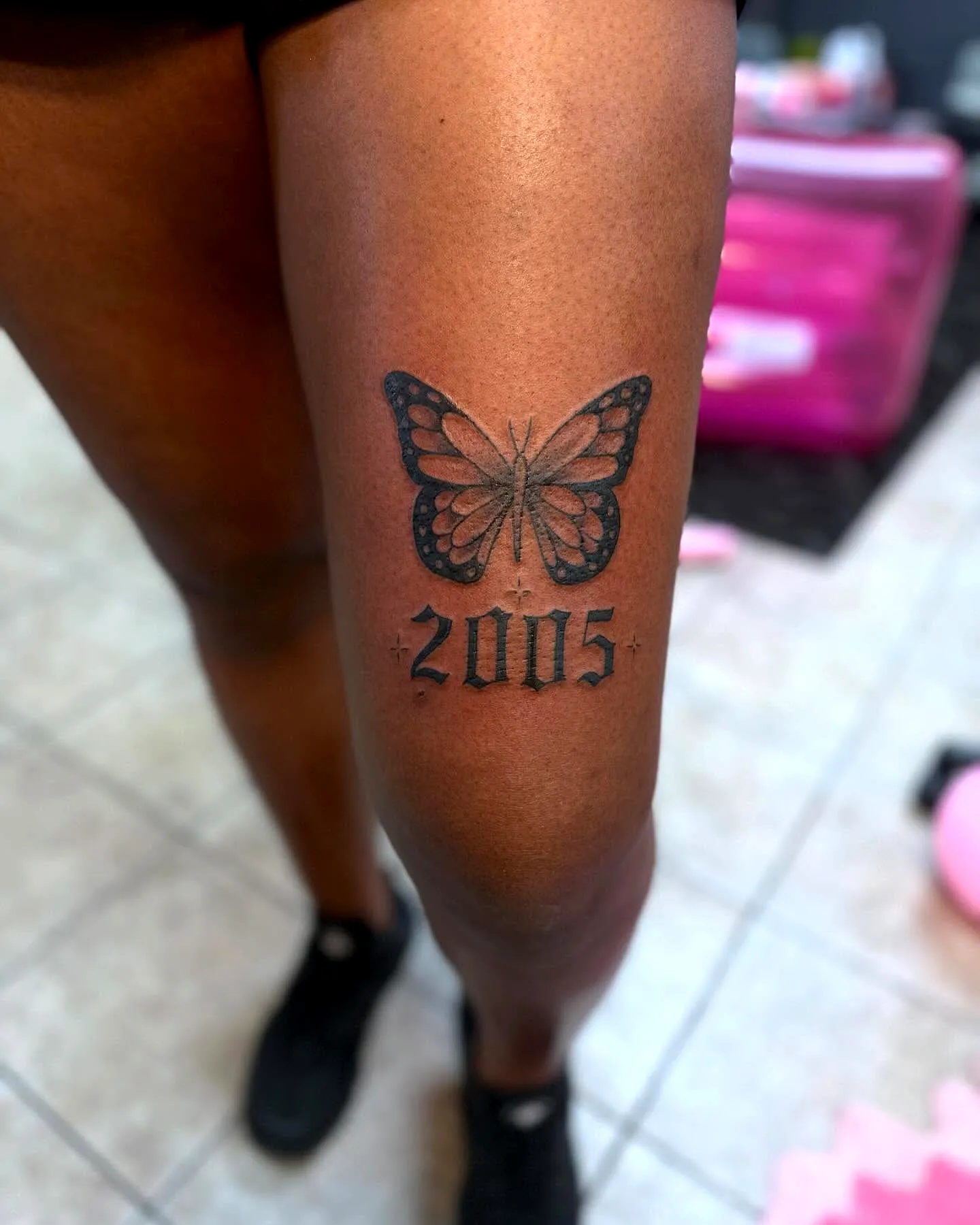 Butterfly Thigh Tattoo with Year 2005