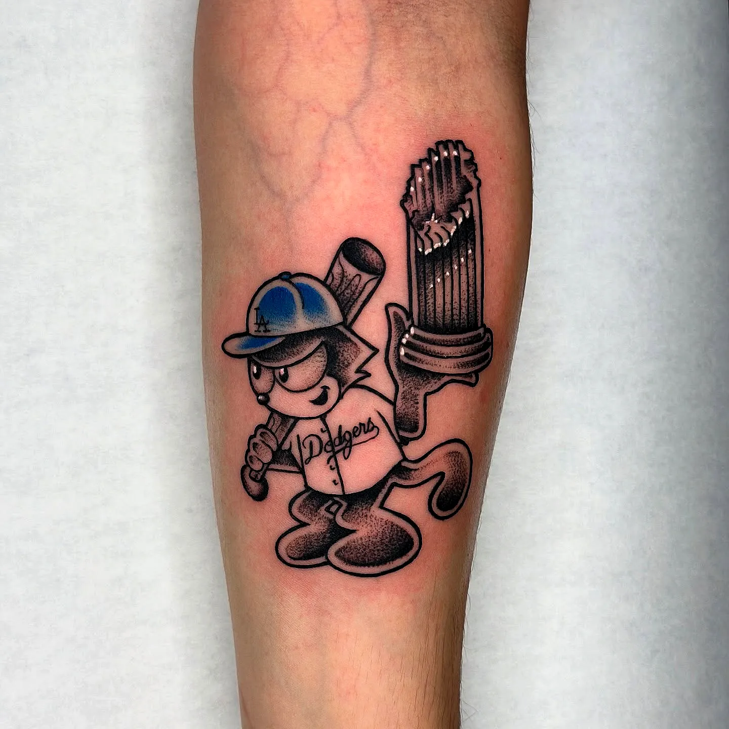 Cartoon Baseball Player Arm Tattoo
