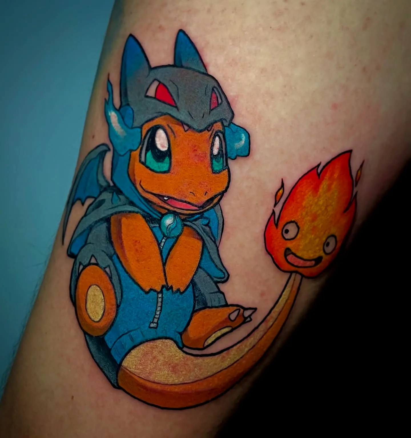 Cartoon Dragon Arm Tattoo in Vibrant Colors