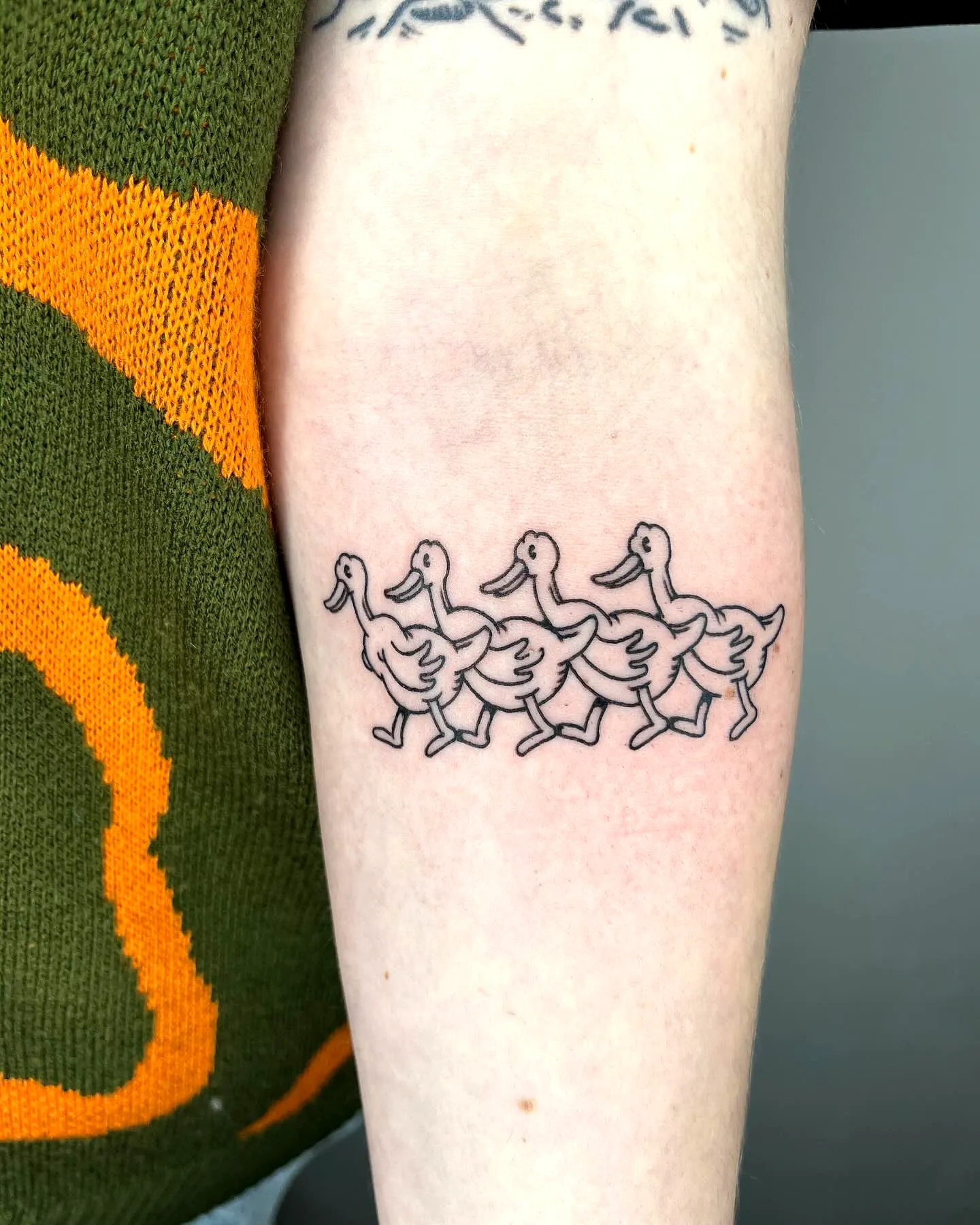 Cartoon Ducks Forearm Tattoo