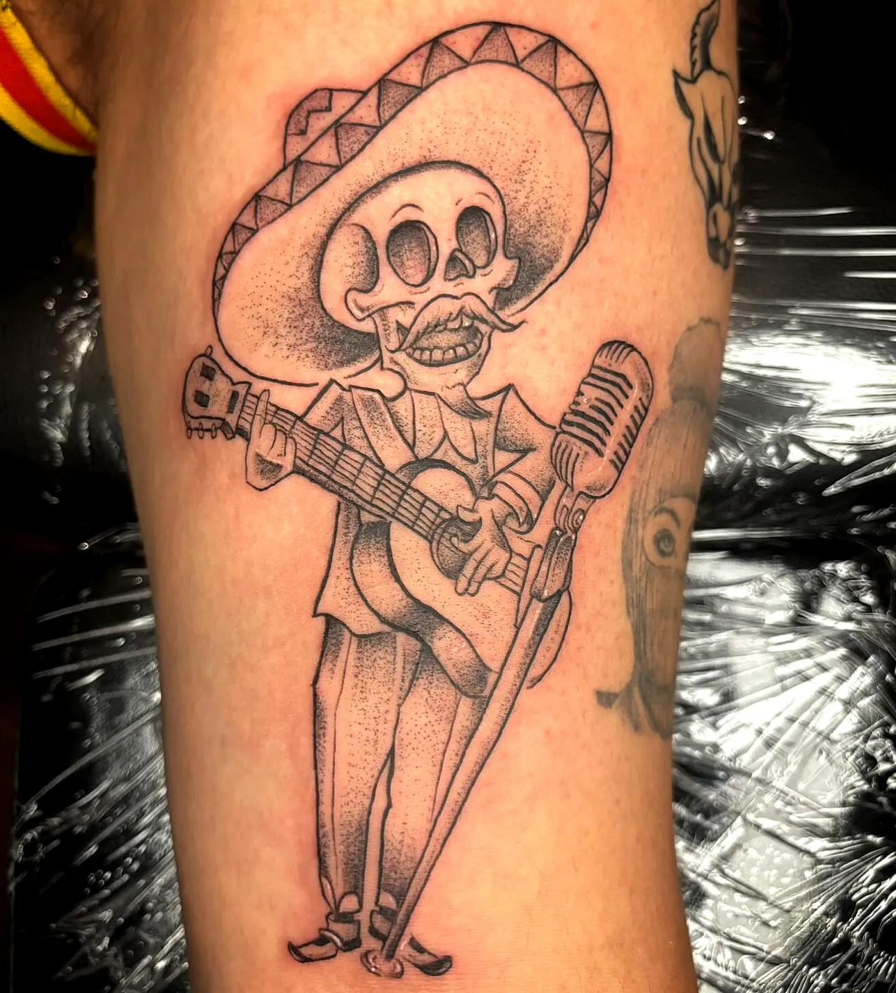 Cartoon Skeleton Suit Arm Tattoo