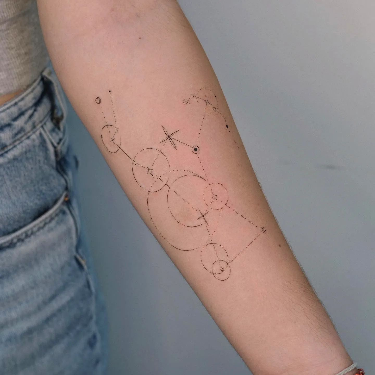 Celestial Forearm Tattoo