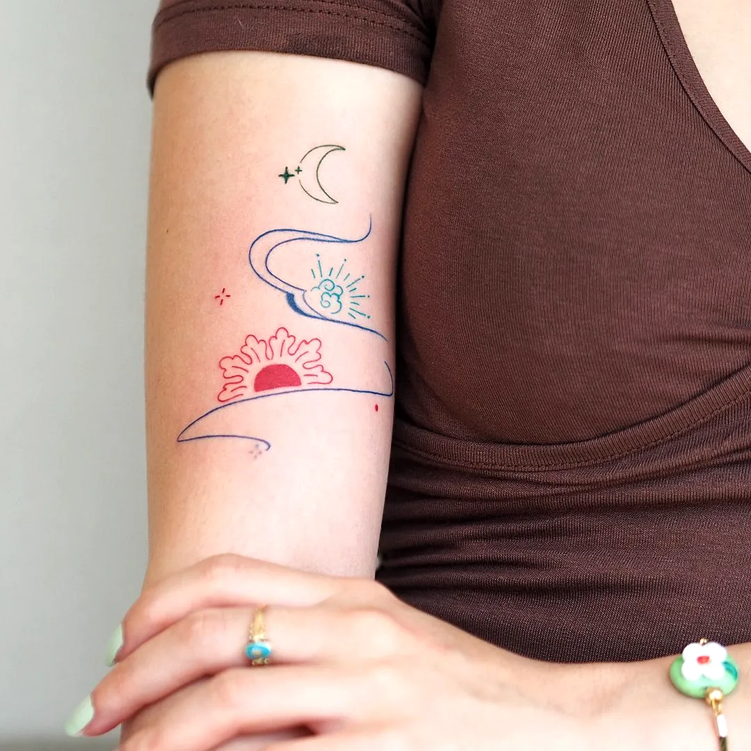 Celestial Forearm Tattoo in Blue and Red