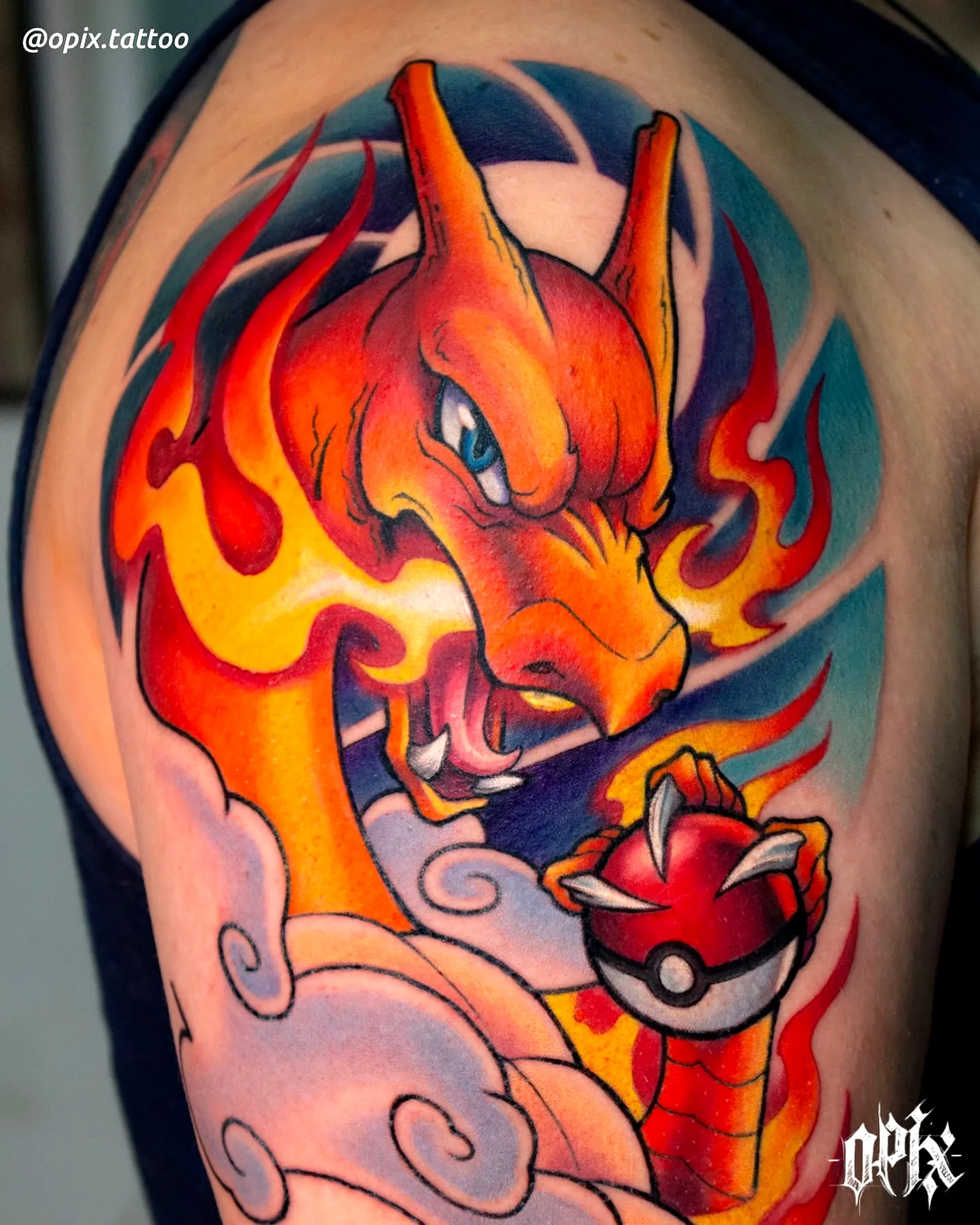 Charizard Upper Arm Tattoo with Flames