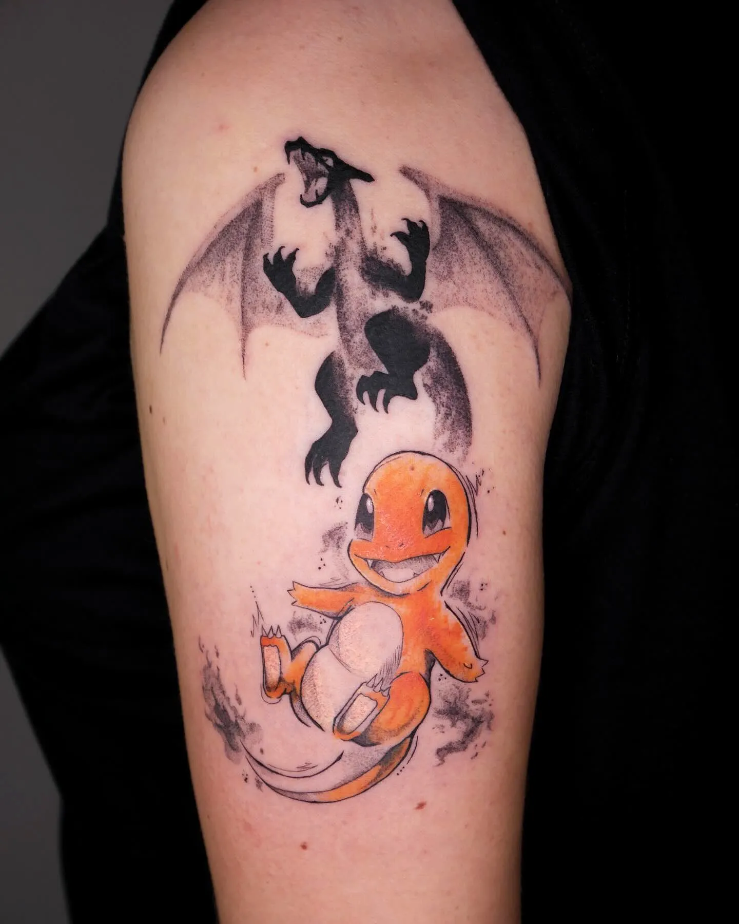 Charmander Arm Tattoo with Charizard Silhouette