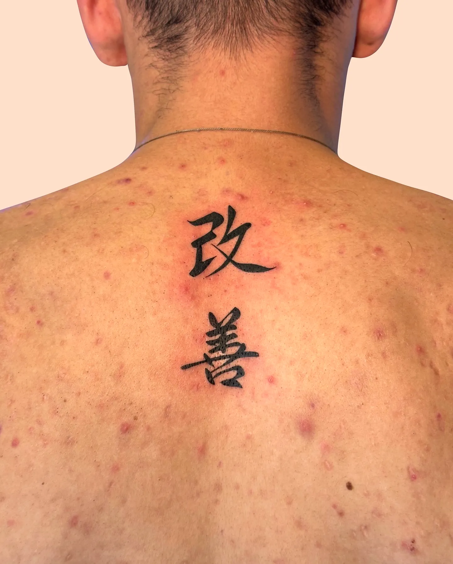 Chinese Calligraphy Upper Back Tattoo