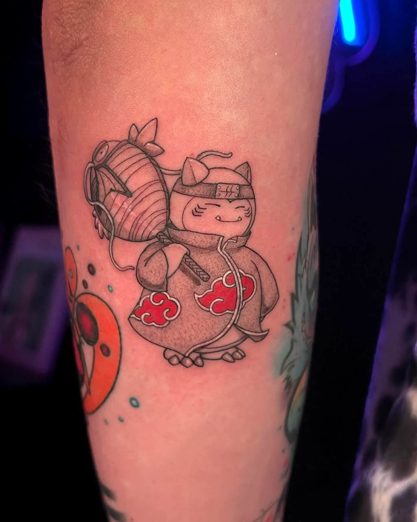 Chubby Creature Arm Tattoo