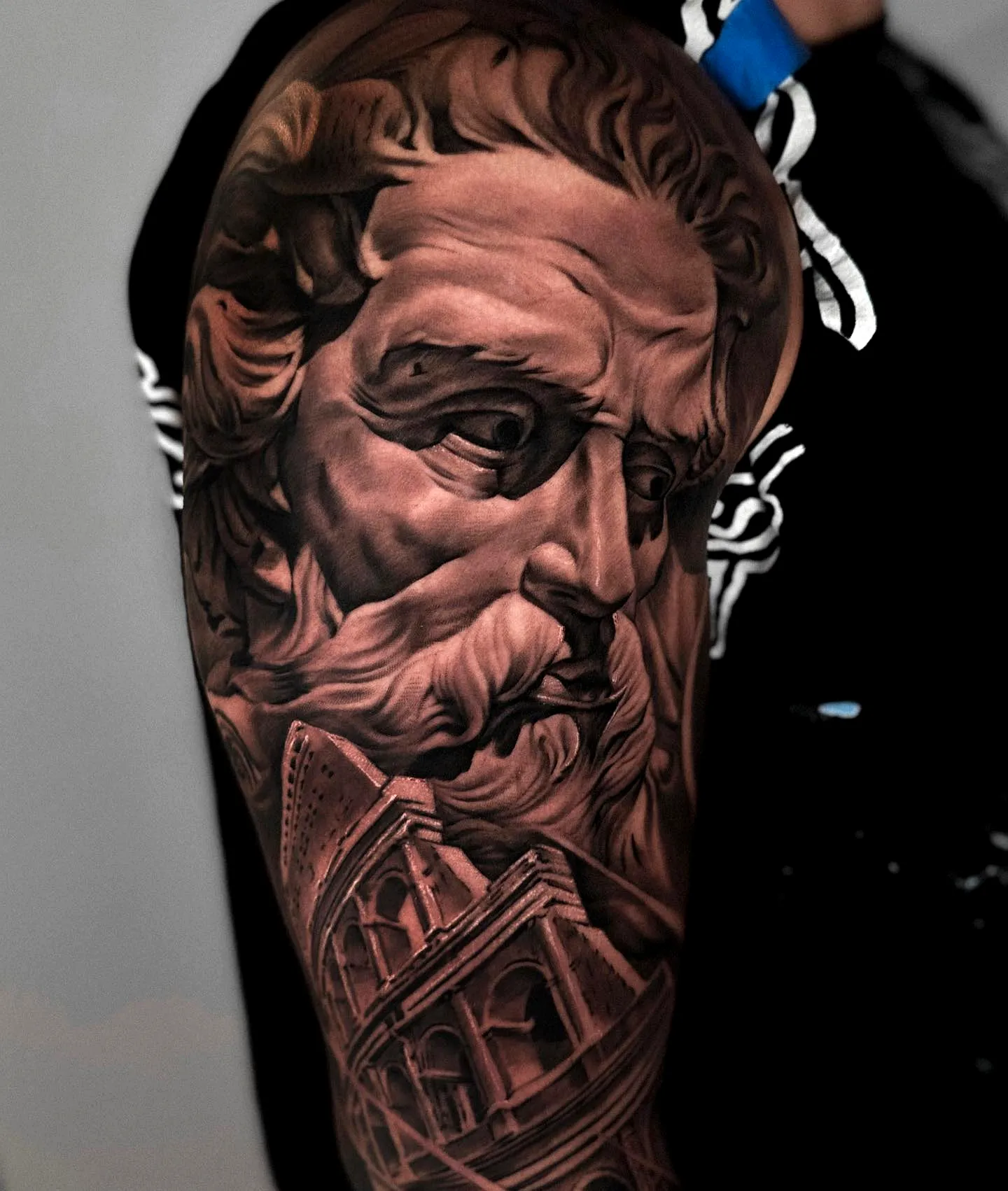 Classical Figure Upper Arm Tattoo