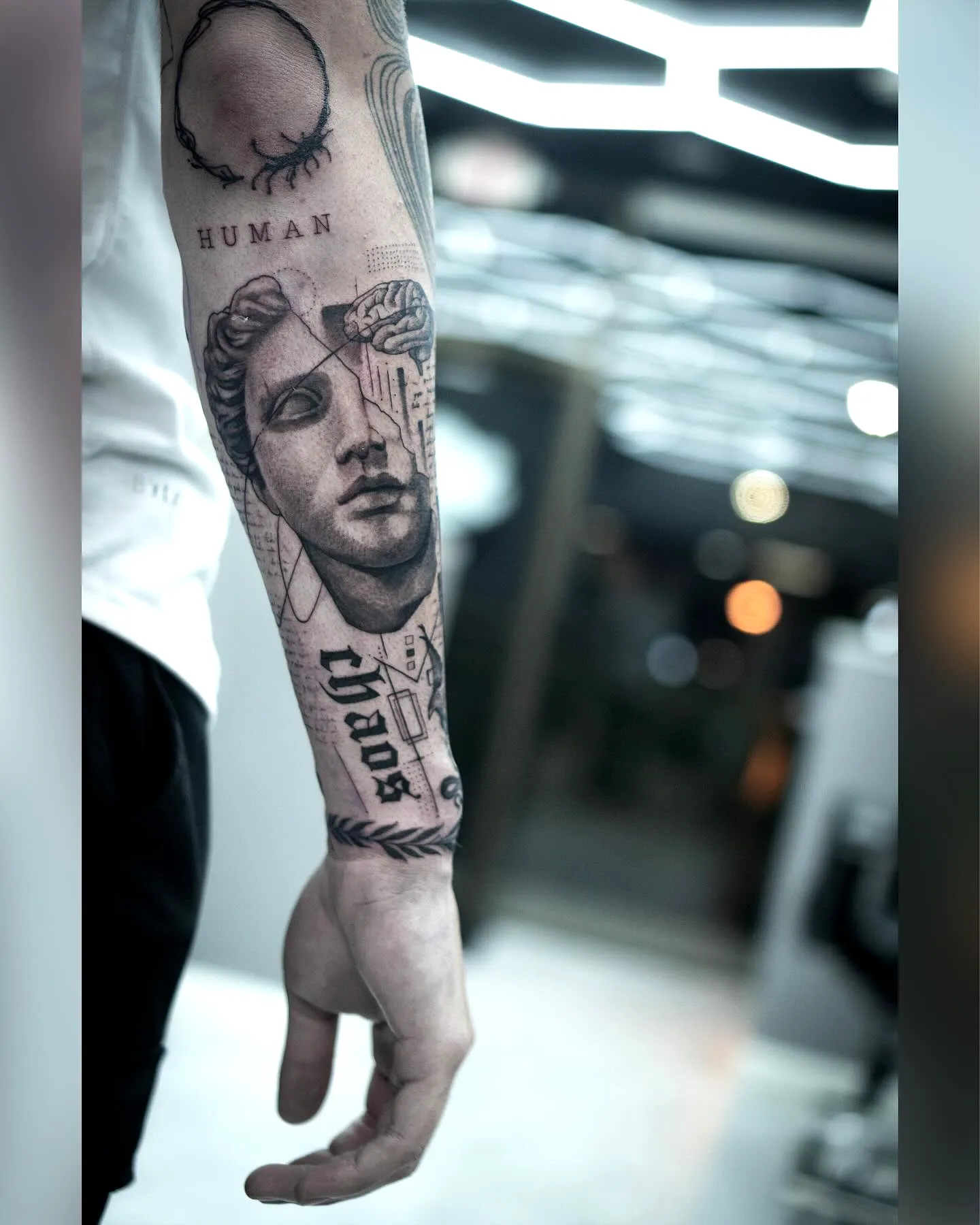 Classical Statue Forearm Tattoo Design