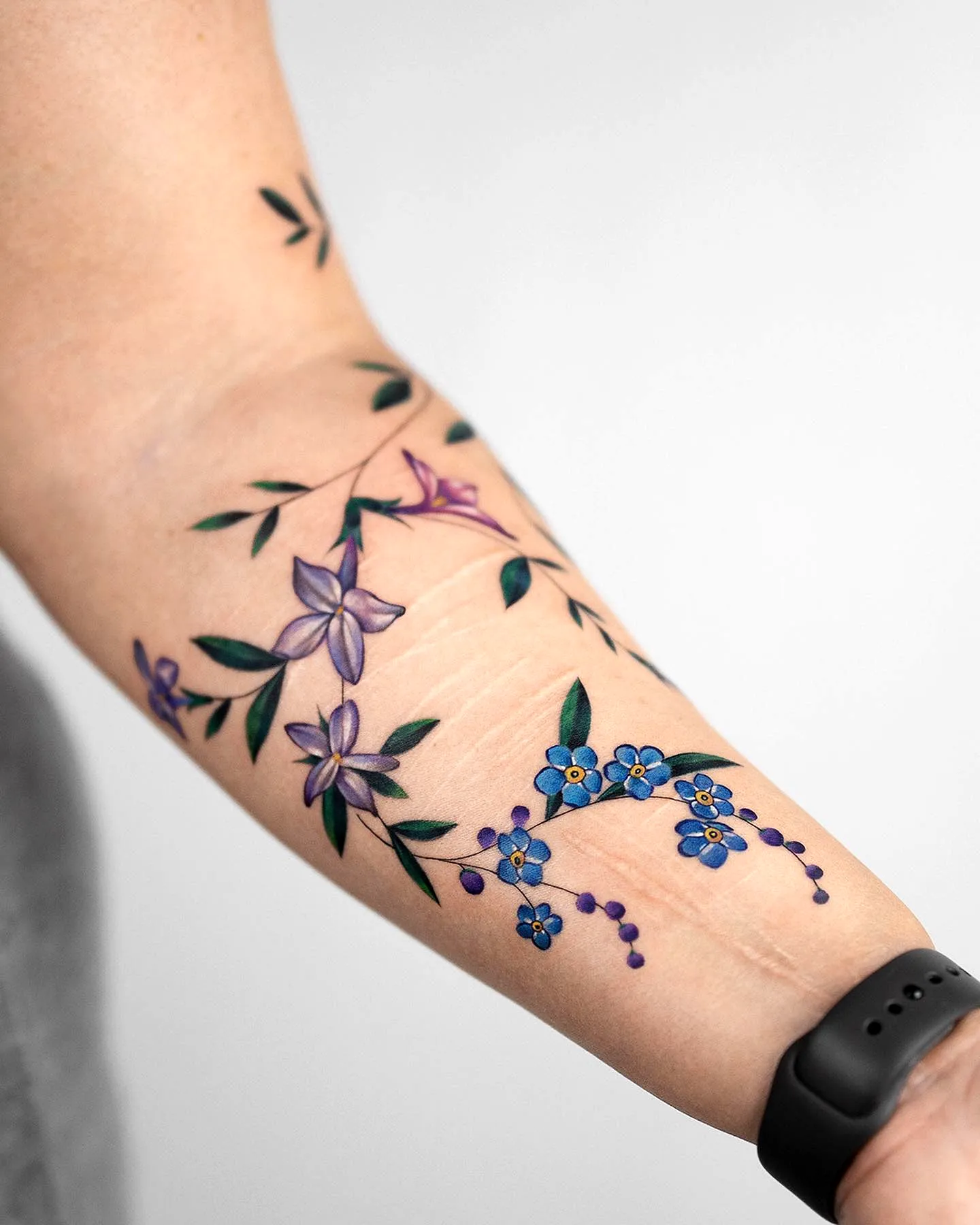 Colorful Floral Forearm Tattoo