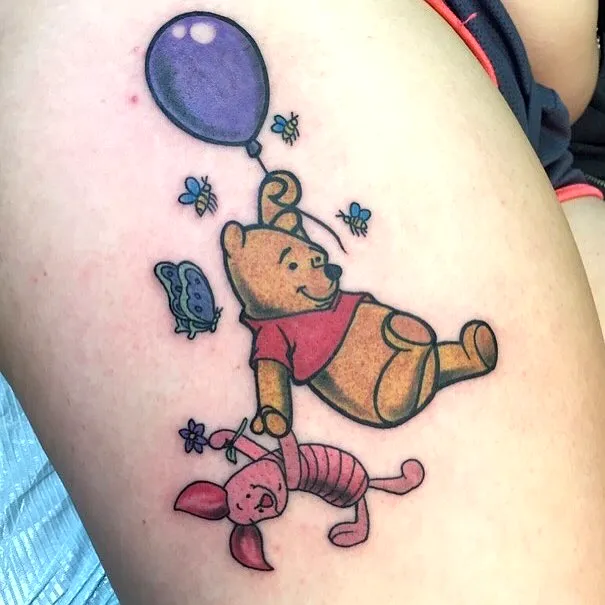 Colorful Winnie the Pooh Arm Tattoo