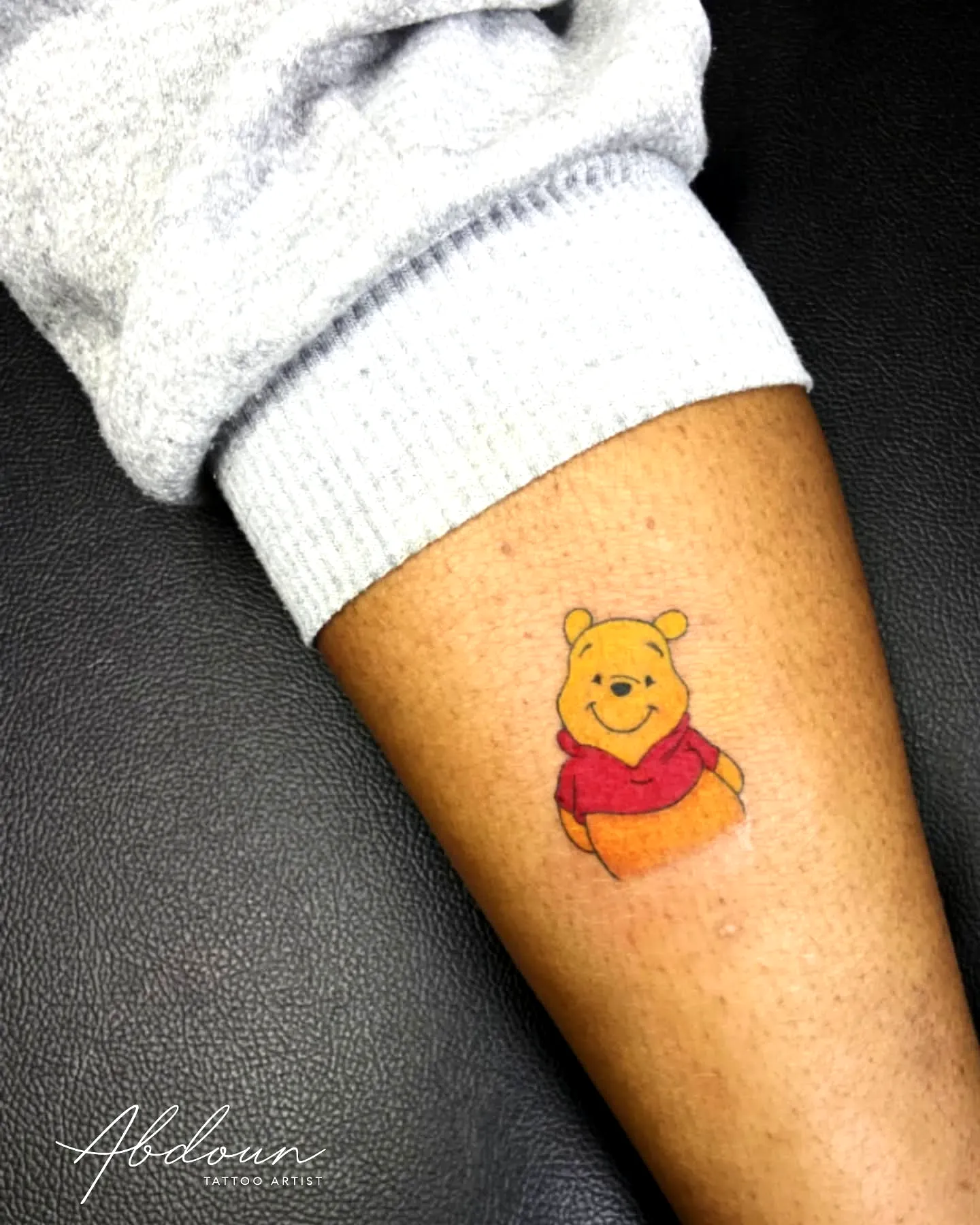 Colorful Winnie-the-Pooh Forearm Tattoo