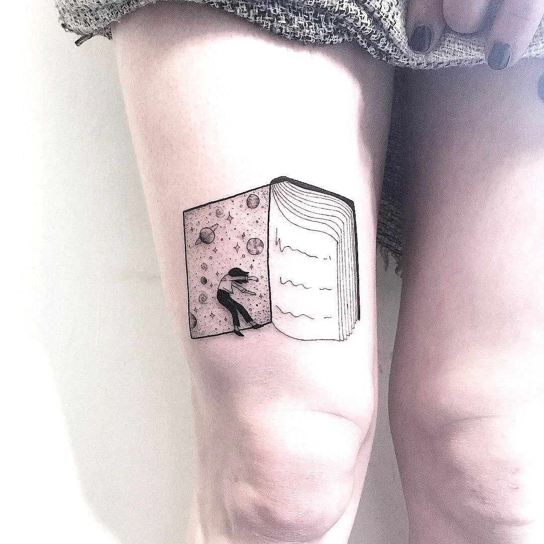 Cosmic Book Thigh Tattoo Design