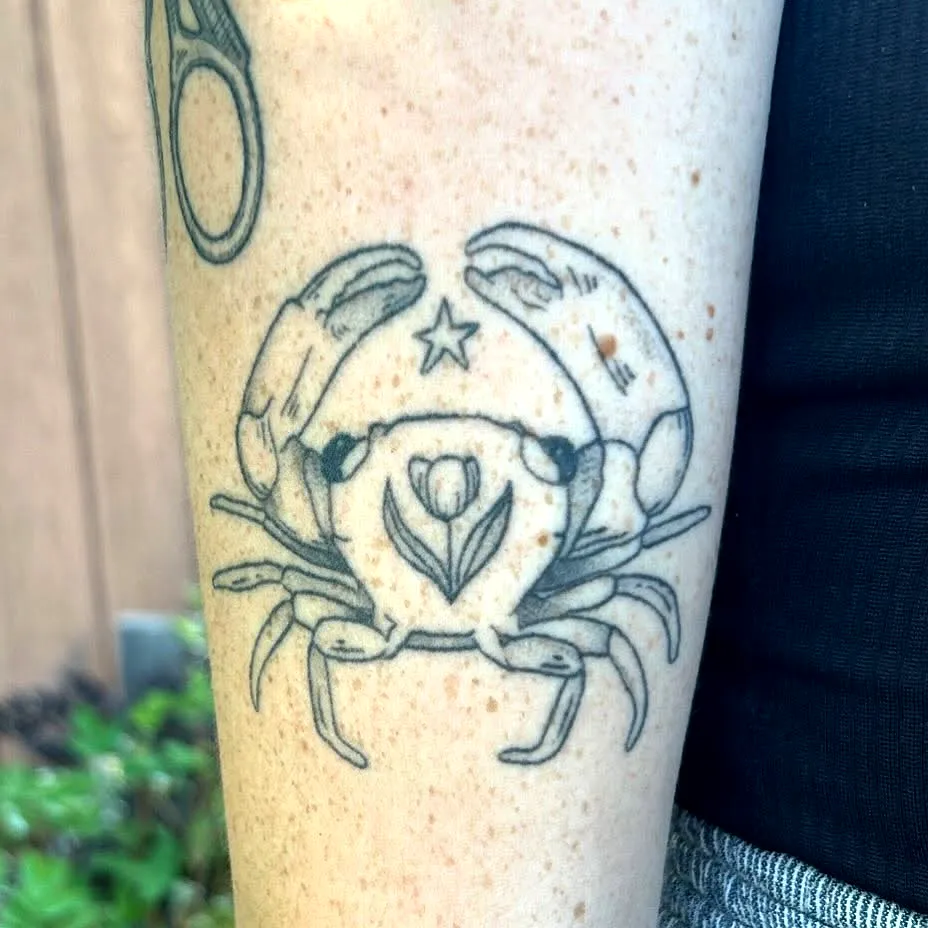 Crab Forearm Tattoo with Floral Motif