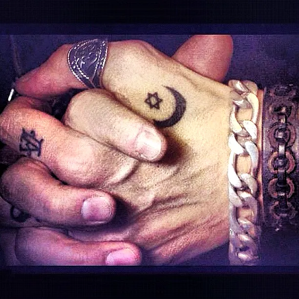 Crescent Moon Hand Tattoo in Black