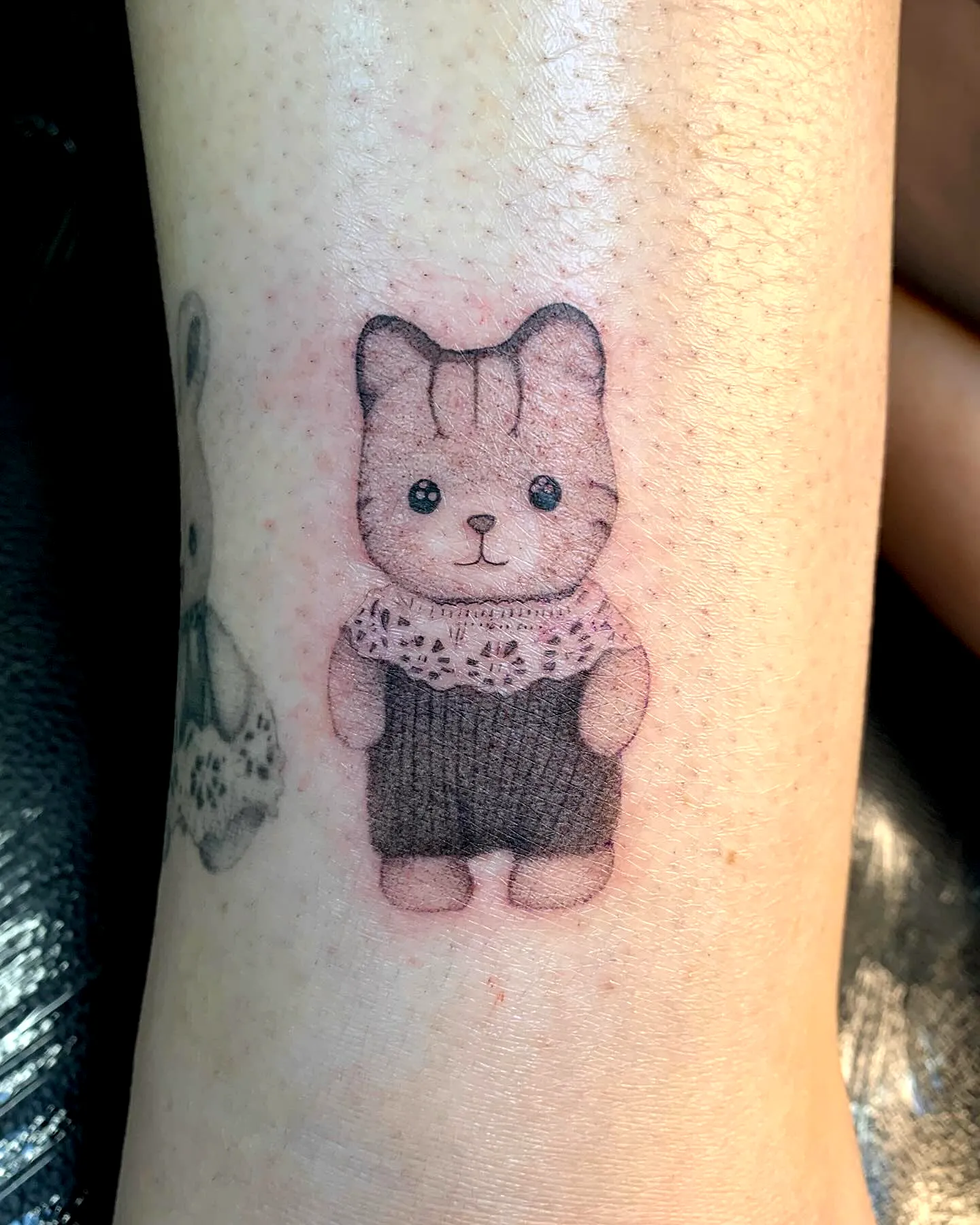 Cute Bear Forearm Tattoo in Pastel Colors