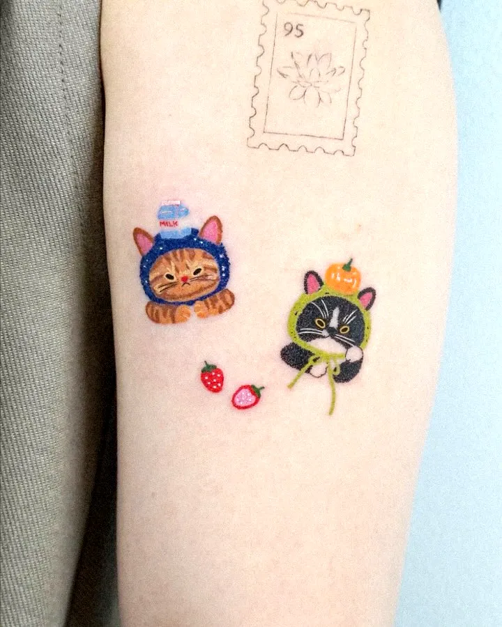 Cute Cat Arm Tattoo with Strawberries