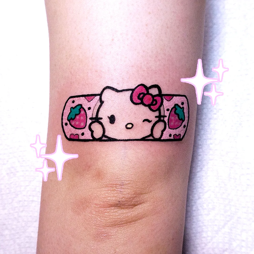 Cute Cat Forearm Tattoo with Strawberries