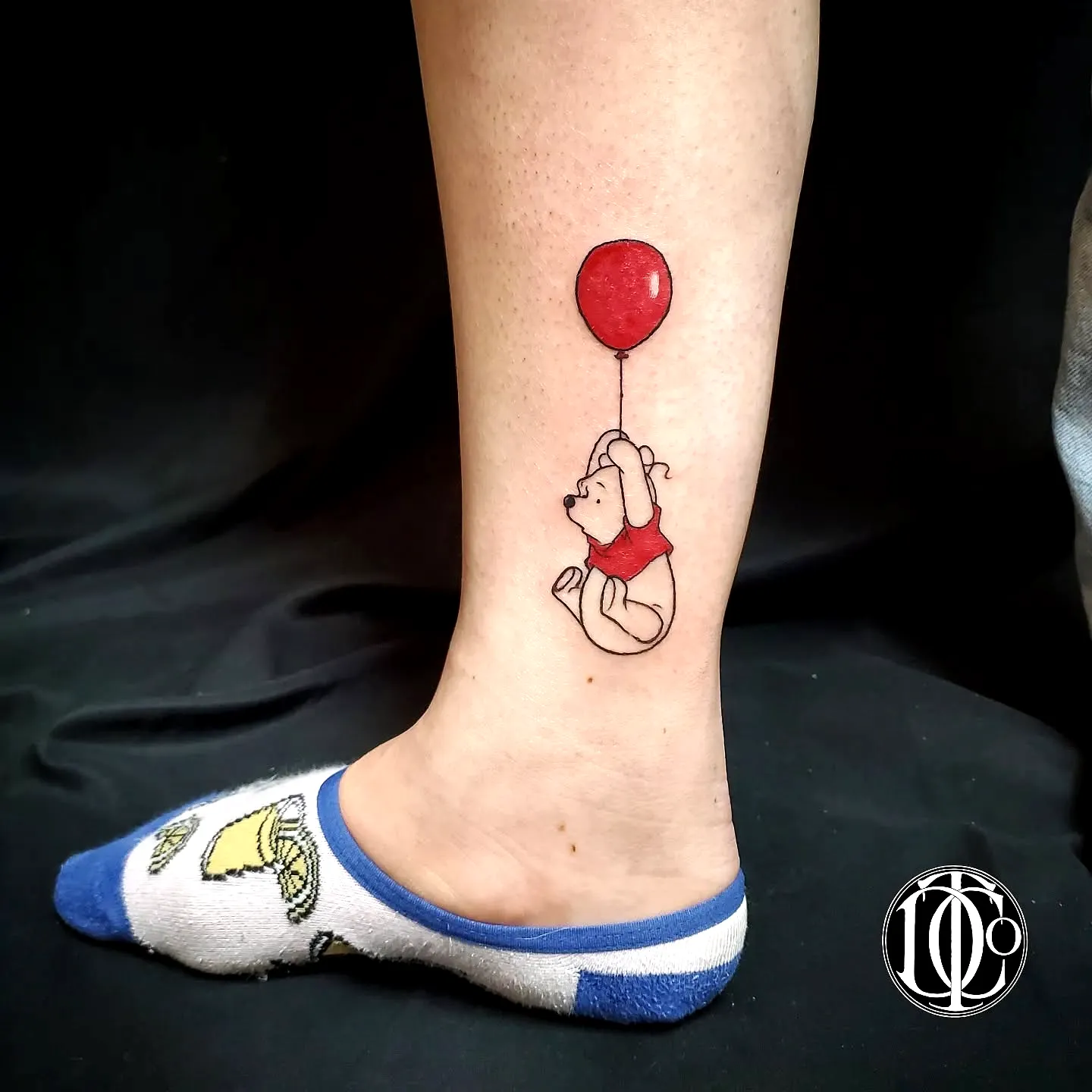 Cute Dog Lower Leg Tattoo with Balloon
