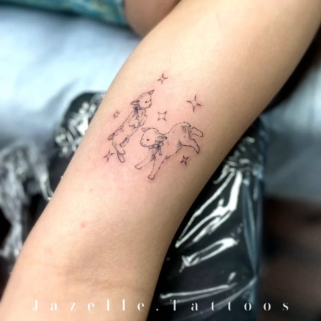 Cute Lambs Forearm Tattoo with Stars