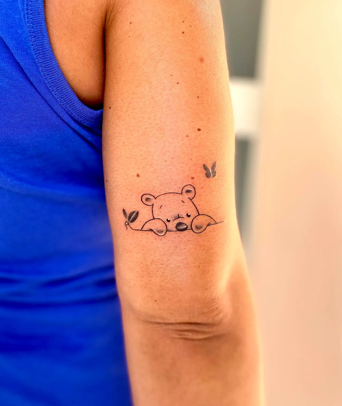 Cute Sleeping Bear Upper Arm Tattoo