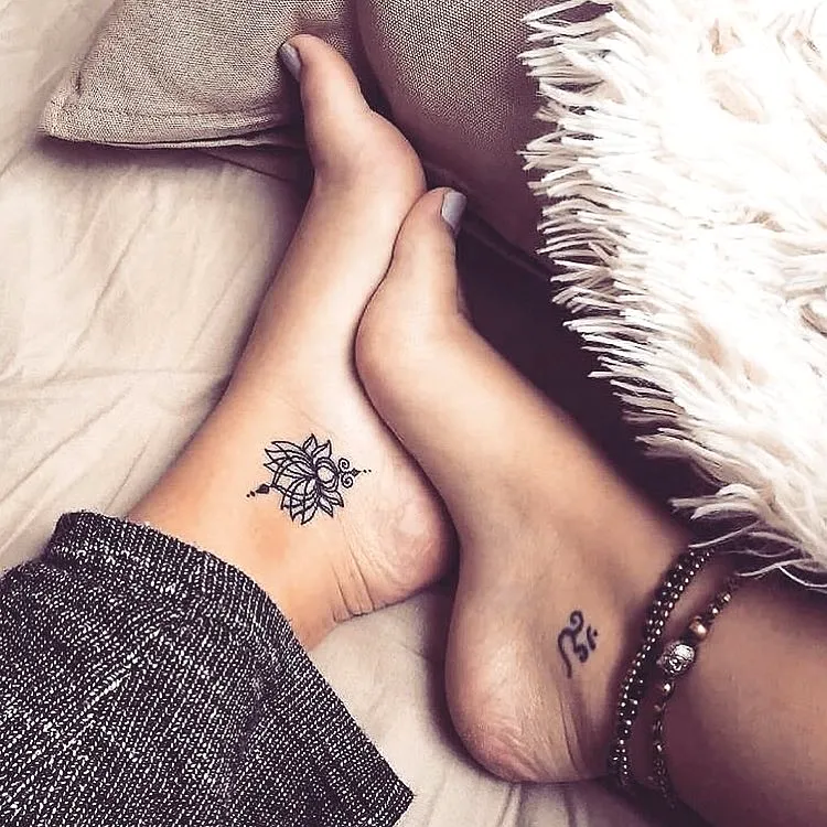 Dainty Black Lotus Foot Tattoo Design