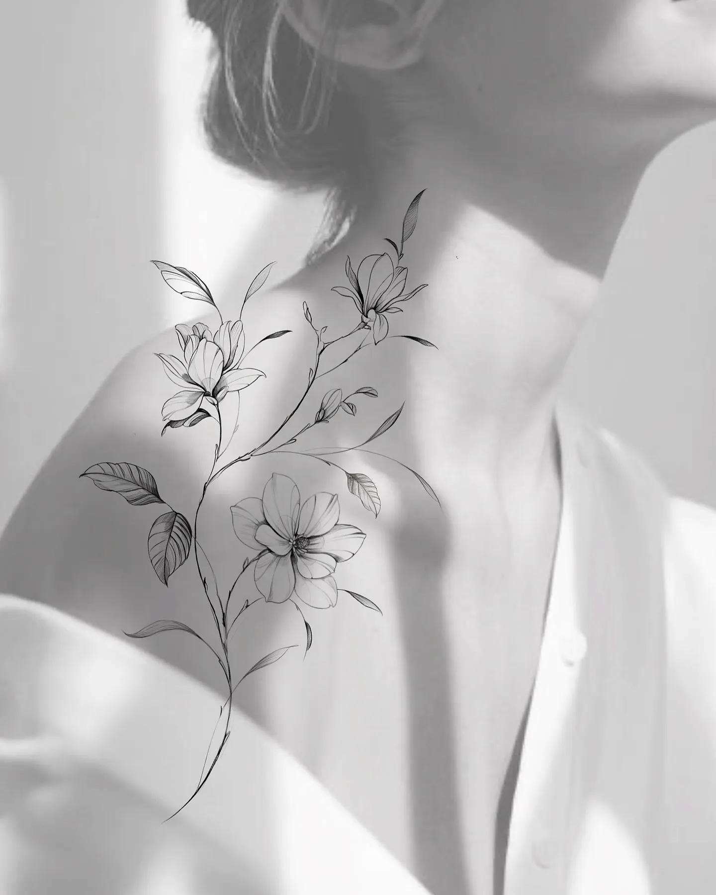 Dainty Floral Shoulder Tattoo Design