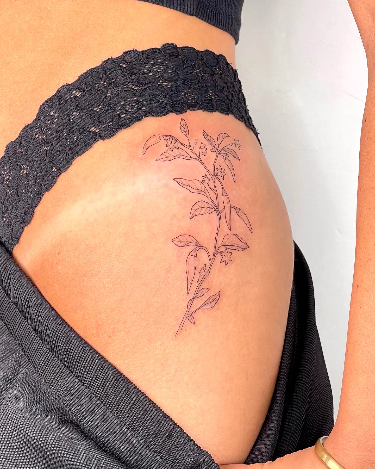Dainty Floral Side Tattoo