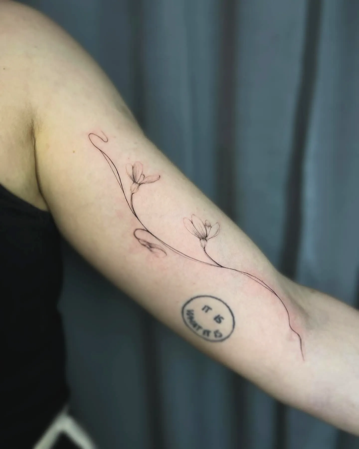 Dainty Floral Upper Arm Tattoo Design