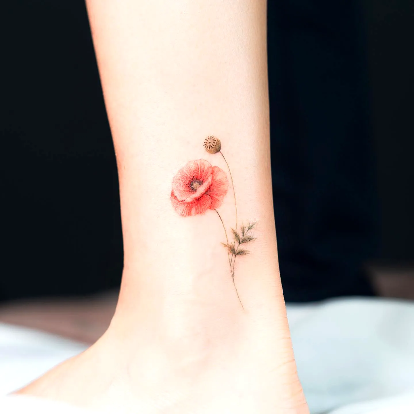 Dainty Poppy Ankle Tattoo in Watercolor