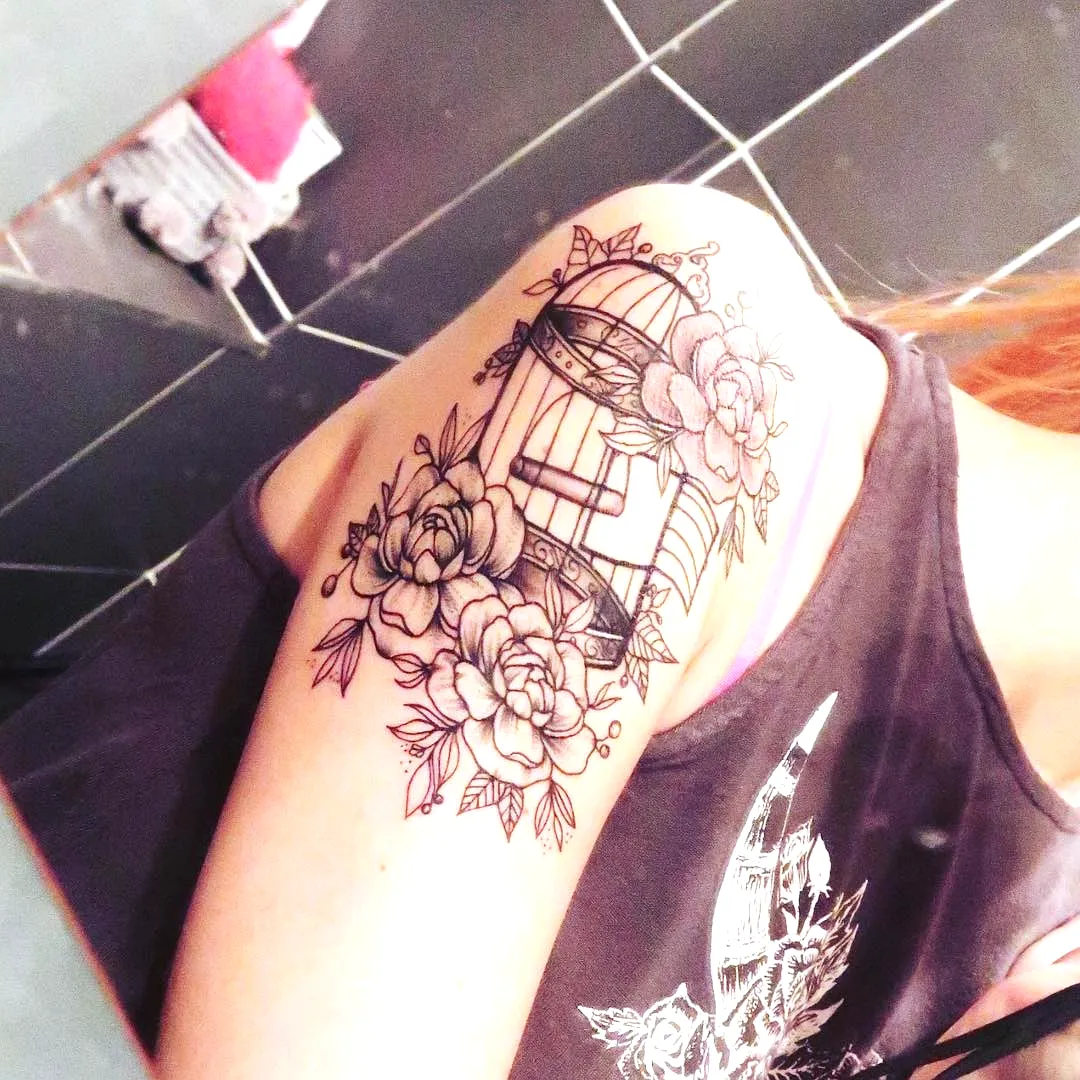 Decorative Birdcage Upper Arm Tattoo