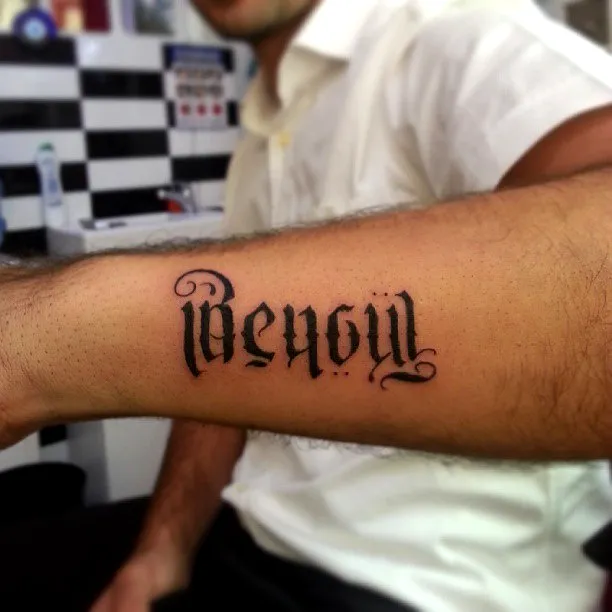 Decorative Script Inner Forearm Tattoo