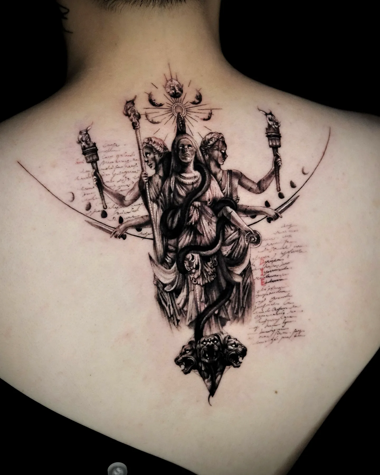 Deity Upper Back Tattoo in Black and Gray