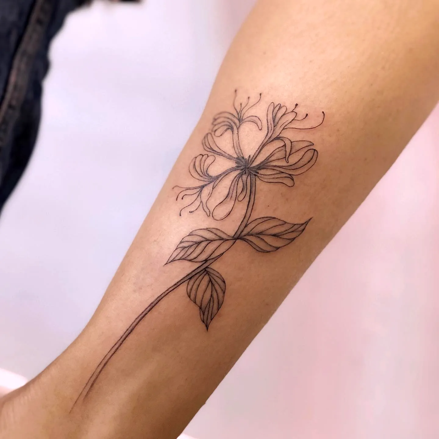 Delicate Flower Forearm Tattoo