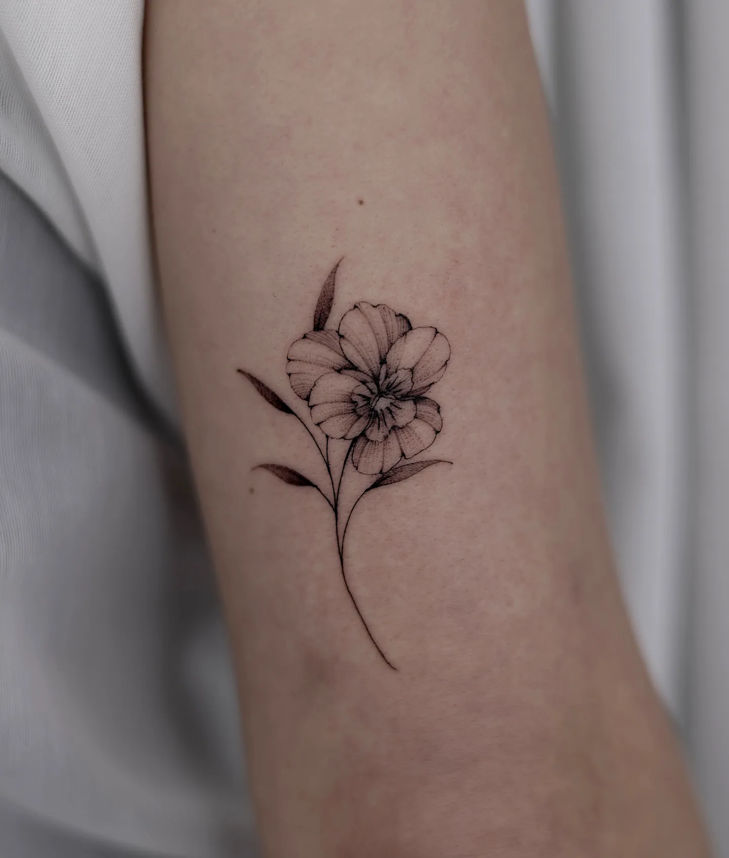 Delicate Flower Forearm Tattoo